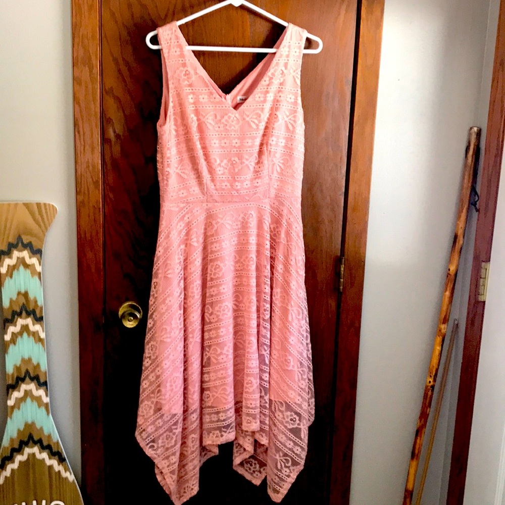 Beautiful peach lace sleeveless dress with back zipper in size medium.